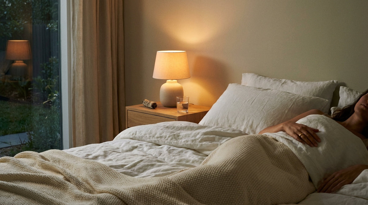 Serene bedroom scene with warm amber light, preparing for restful sleep